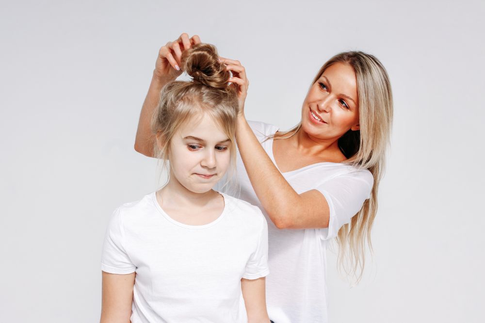 Mom Hairstyling her daughter