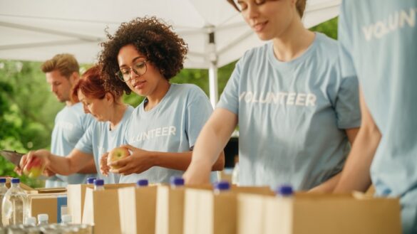 Portrait of a Black Latina Female Volunteer Preparing Free Food