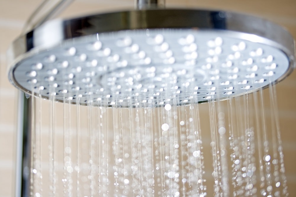 What's Harming Your Hair, Skin, & Health In Your Shower Water
