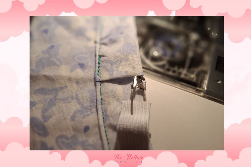 Pop a safety pin onto the end of your elastic and work it through the waistband casing