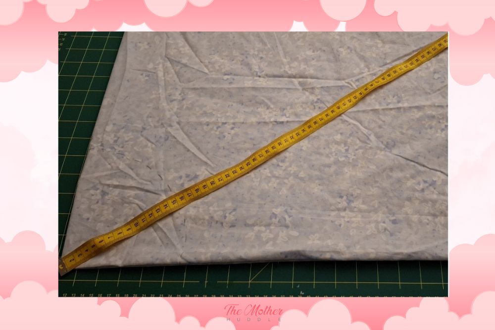 mark the same 14.5cm measurement at different places, forming an arc across your fabric.