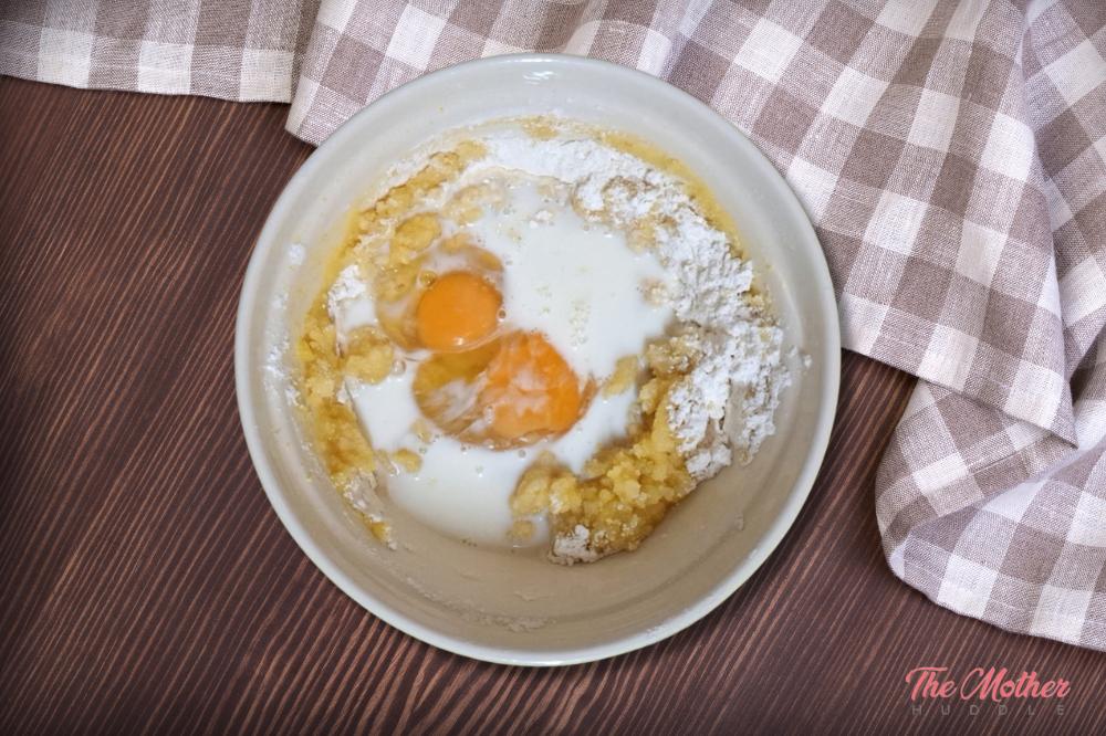 Add eggs and milk and beat well for 5 minutes.
