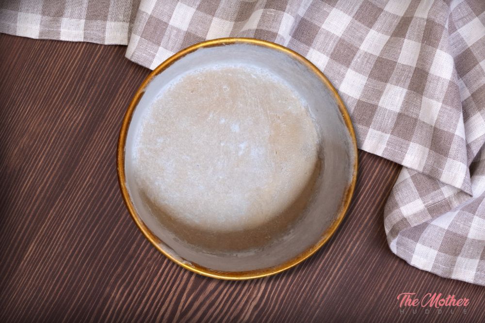 coat the entire inside of your cake tin with butter
