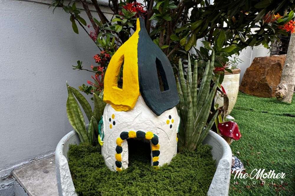 Place the Fairy house in the center of the pot