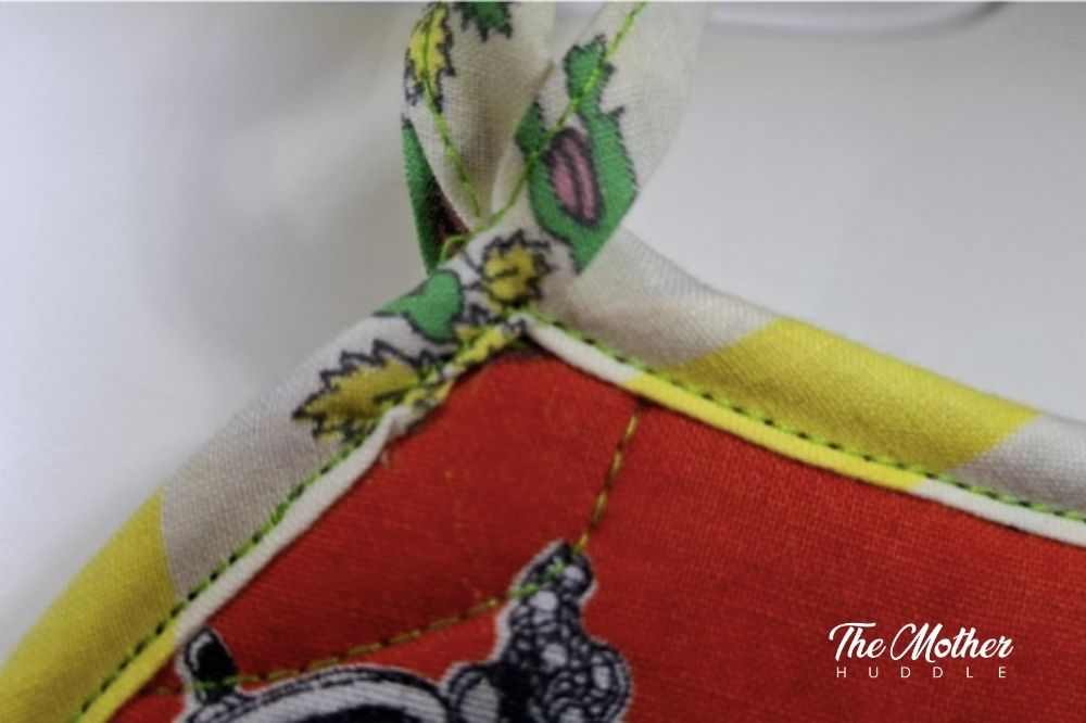 Step 8 - Make sure to topstitch right up onto the base of the hanging loop