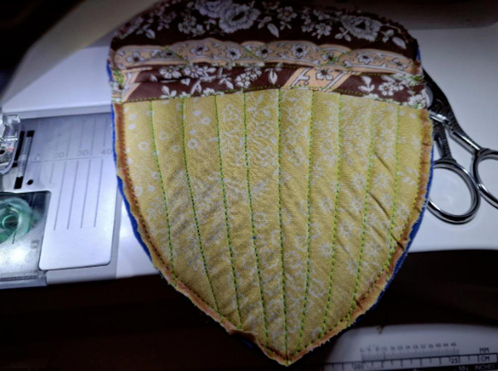 Trim off any edges beyond that narrow seam allowance, and it should look like this from the front