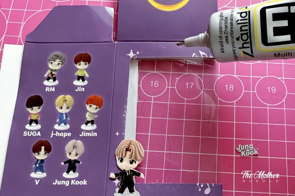 glue the name of the Tiny Tan member in the middle of the top of the window